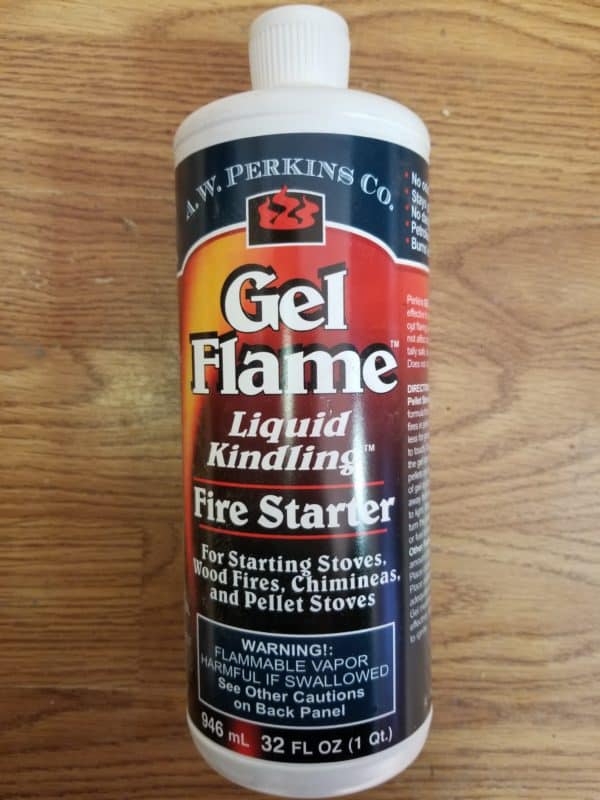 A bottle of Gel Fire Starter 32FL OZ, designed for starting stoves, wood fires, chimineas, and pellet stoves. The bottle contains 32 fl oz (946 ml).